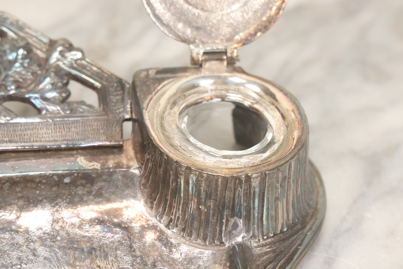 Lot 052 - Antique Cast Iron Double Inkwell With Chrome Finish Depicting Fox Head, Oak Branches, And English Hunting Scene With Hunter, Dog, And Stag, Stamped L.P., Circa Early 20th Century