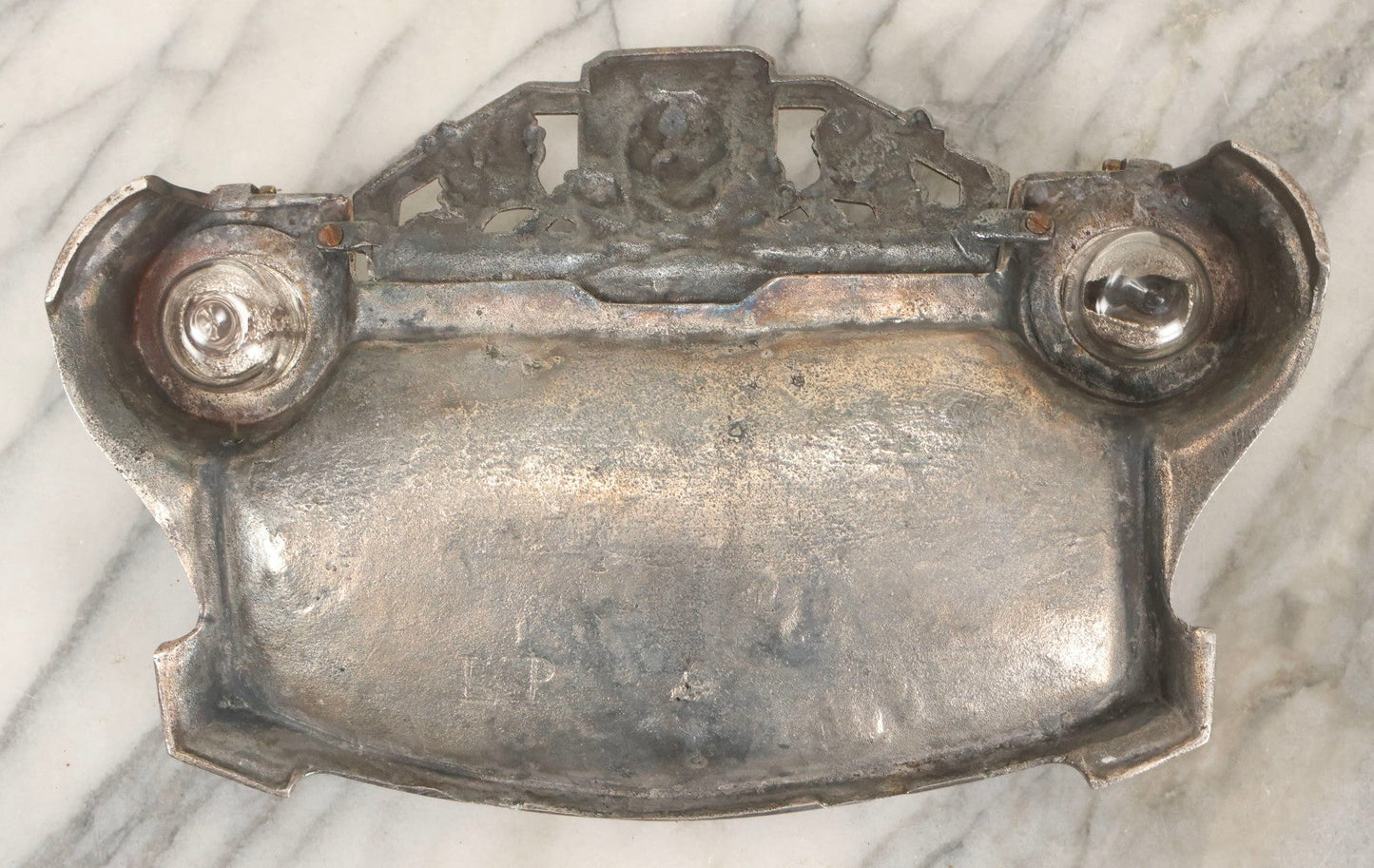 Lot 052 - Antique Cast Iron Double Inkwell With Chrome Finish Depicting Fox Head, Oak Branches, And English Hunting Scene With Hunter, Dog, And Stag, Stamped L.P., Circa Early 20th Century