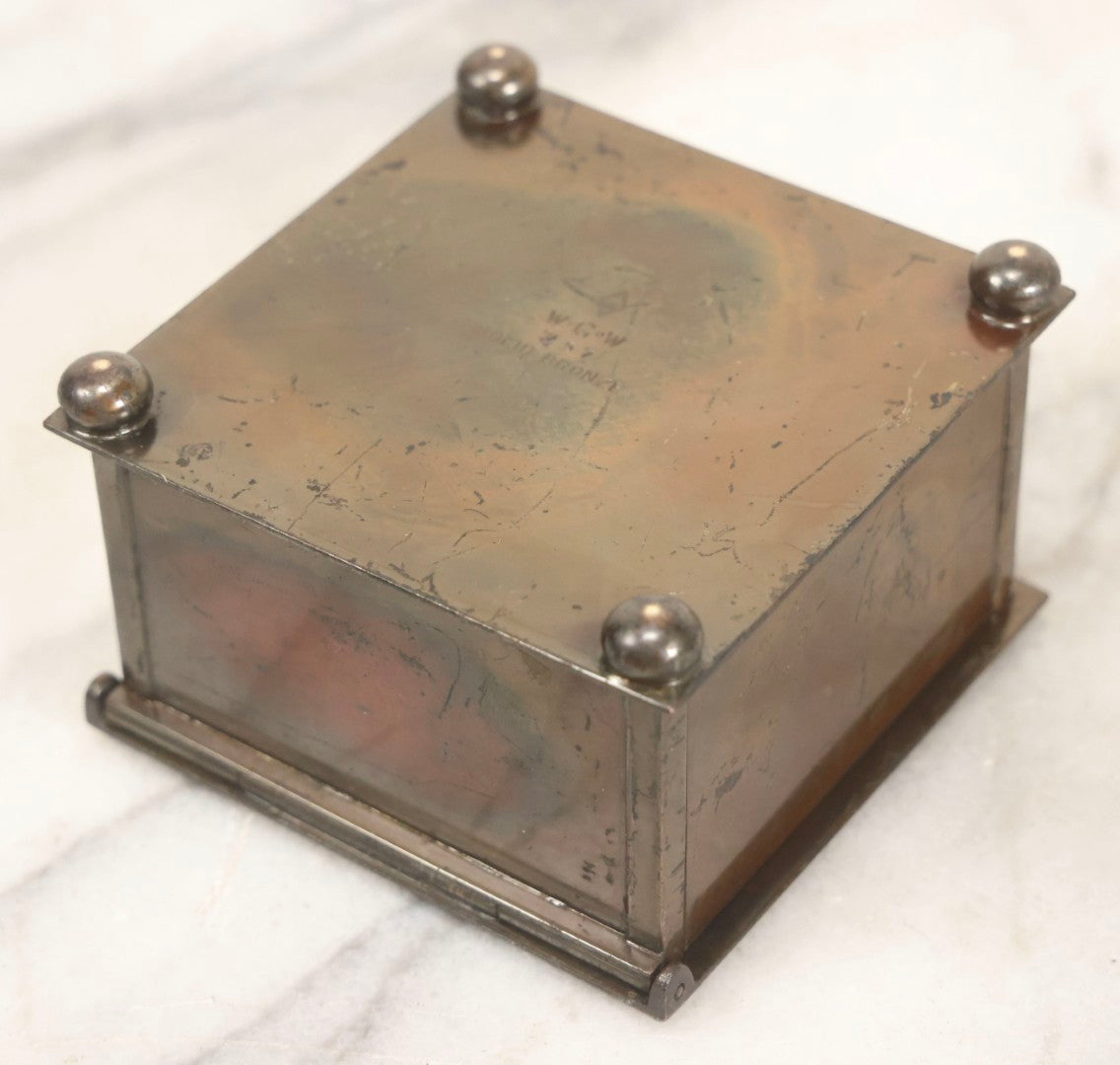 Lot 054 - Antique Solid Bronze Square Inkwell, Stamped “W.G.W.” With “W” In Diamond, “257,” And “Solid Bronze,” On Four Ball Feet, With Glass Insert, Circa Early 20th Century