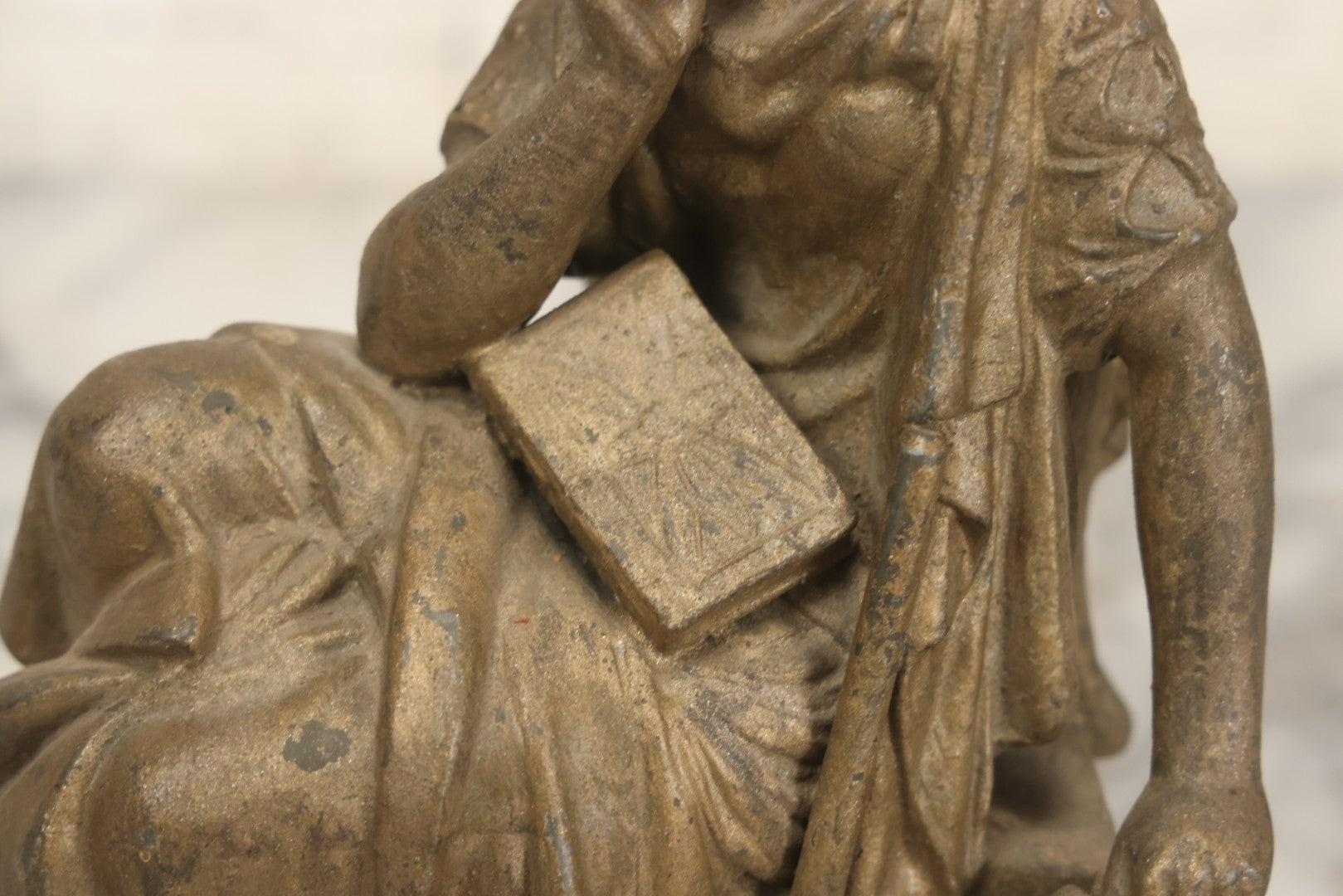 Lot 057 - Antique Cast Spelter Metal Clock Topper Statue With Bronze Wash Depicting Goddess-Like Woman Beside Gear, Anvil, And Blacksmith's Hammer, 8-1/2" H