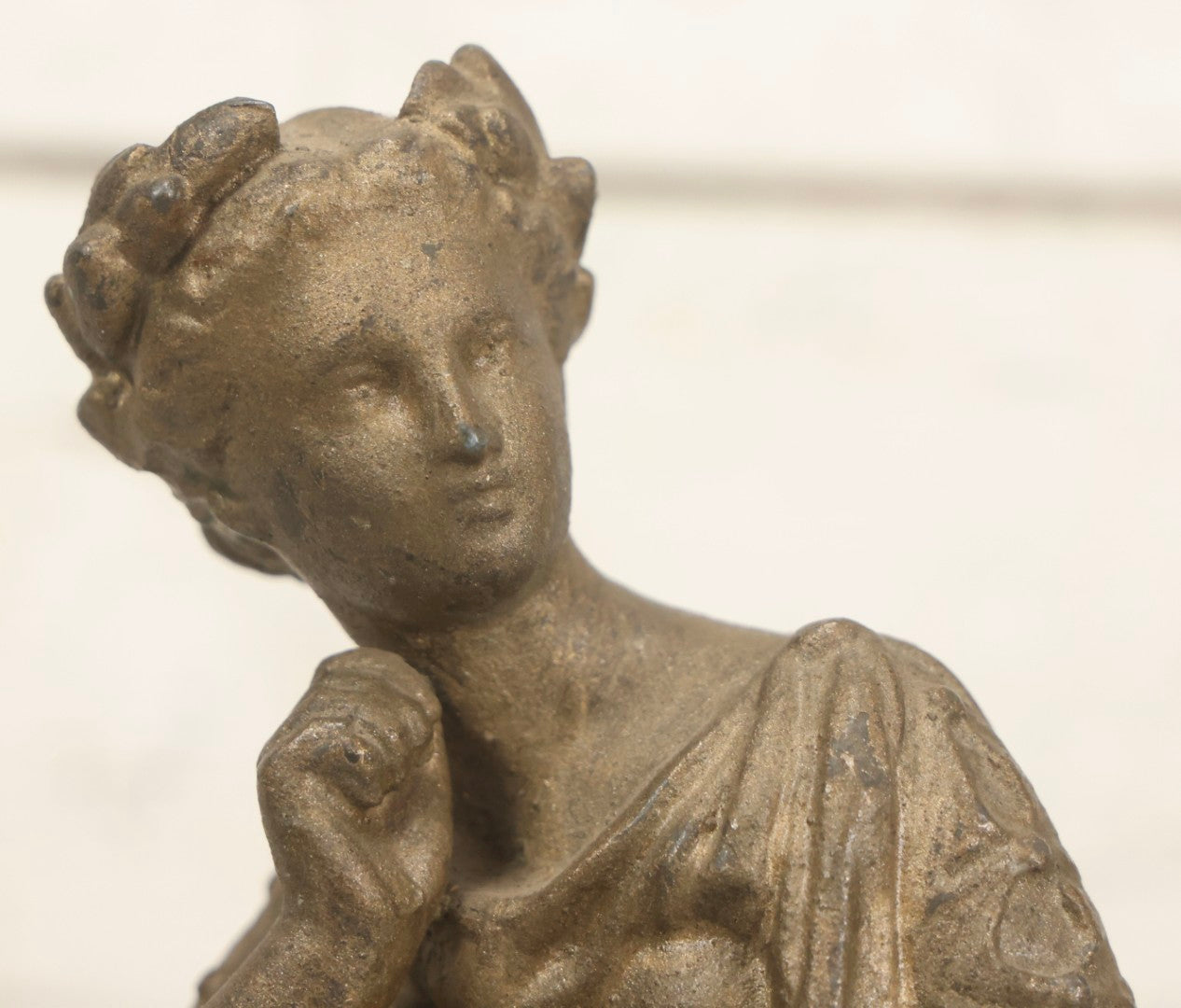 Lot 057 - Antique Cast Spelter Metal Clock Topper Statue With Bronze Wash Depicting Goddess-Like Woman Beside Gear, Anvil, And Blacksmith's Hammer, 8-1/2" H