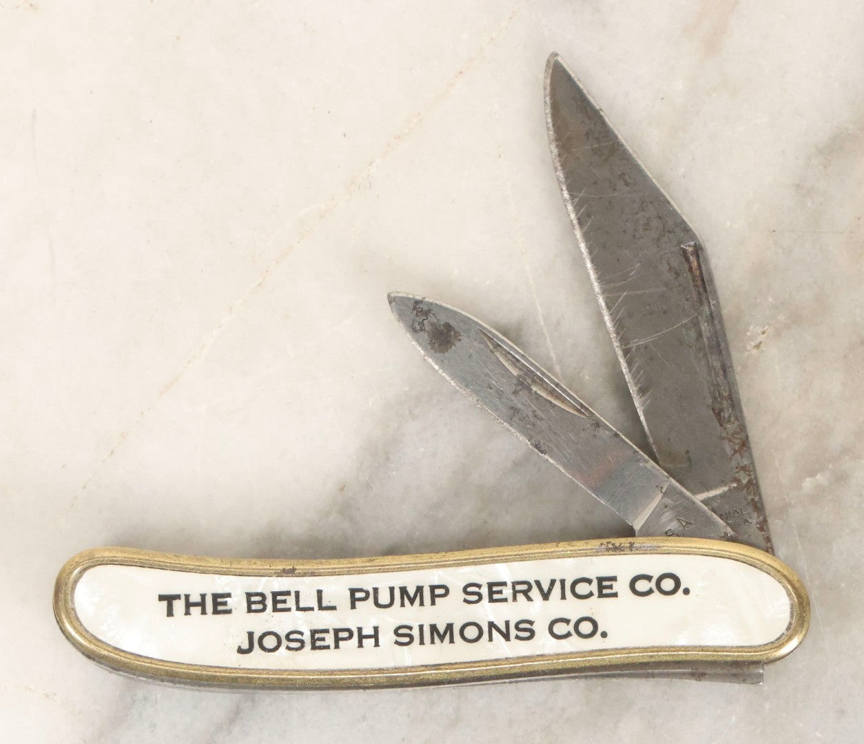 Lot 067 - Vintage Brass-Framed Pocket Knife With Mother-Of-Pearl Inlay Advertising The Bell Pump Services Co. And Joseph Simons Co., Colonial, Providence, Rhode Island, 3-1/4" L
