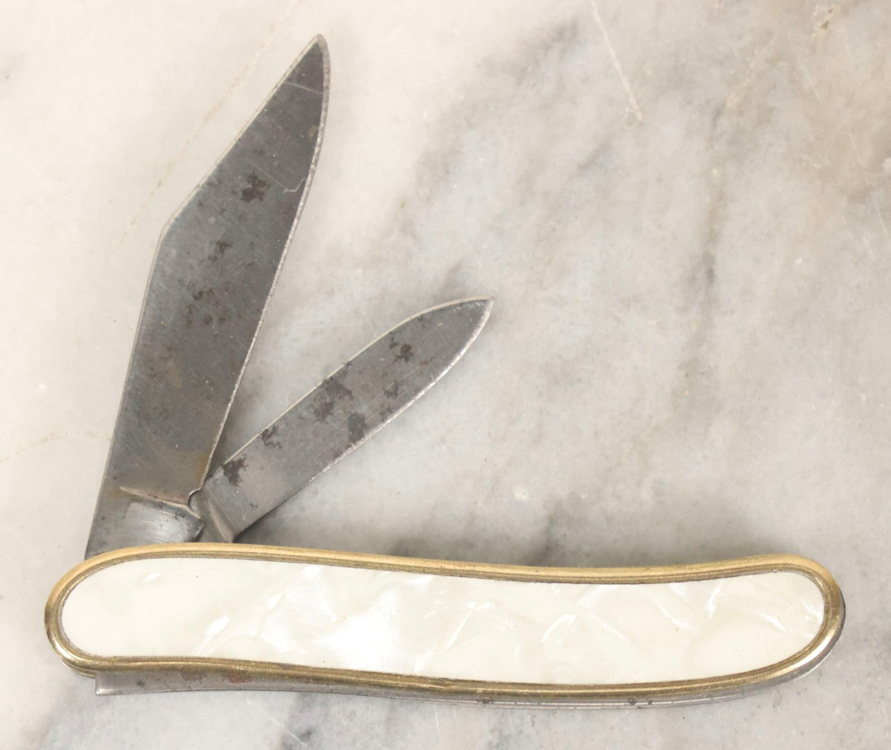 Lot 067 - Vintage Brass-Framed Pocket Knife With Mother-Of-Pearl Inlay Advertising The Bell Pump Services Co. And Joseph Simons Co., Colonial, Providence, Rhode Island, 3-1/4" L