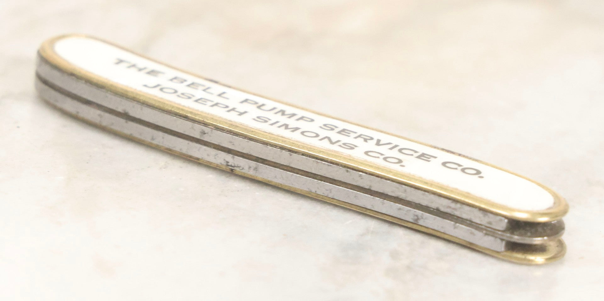 Lot 067 - Vintage Brass-Framed Pocket Knife With Mother-Of-Pearl Inlay Advertising The Bell Pump Services Co. And Joseph Simons Co., Colonial, Providence, Rhode Island, 3-1/4" L