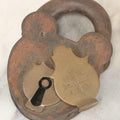 Lot 072 - Antique Cast Iron And Brass Padlock Marked “B.M.Co.” With Cross Motif On Brass Cover, Unlocked, No Key