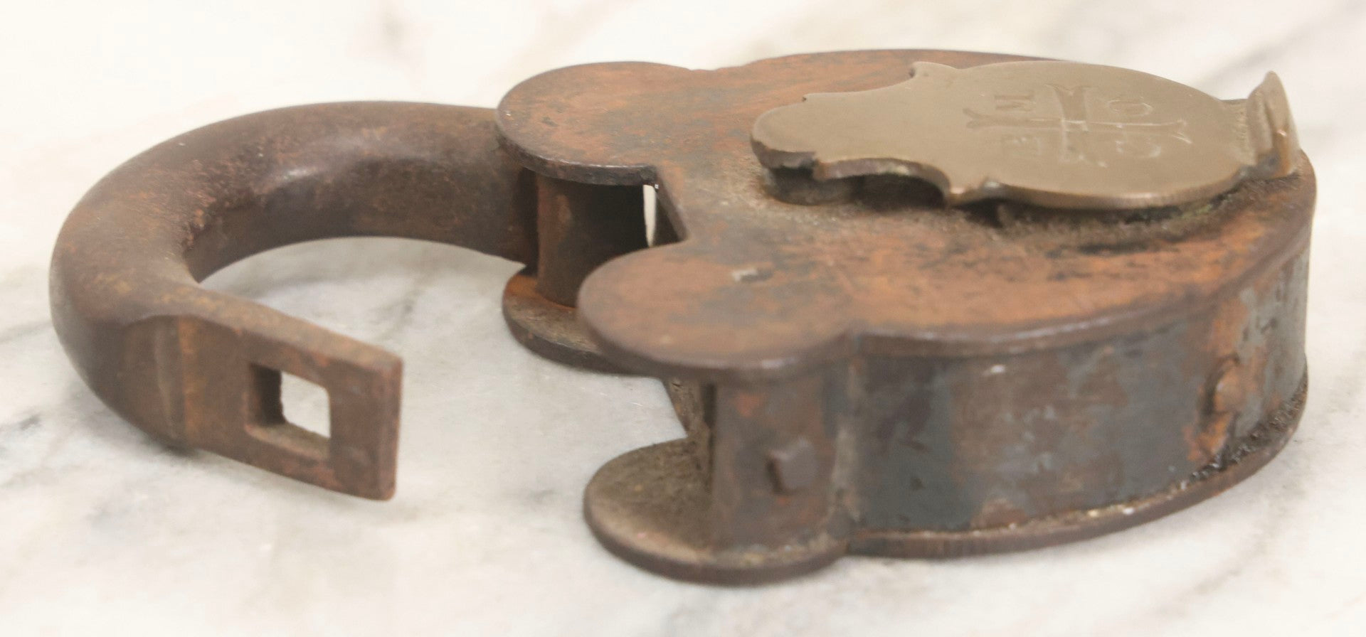 Lot 072 - Antique Cast Iron And Brass Padlock Marked “B.M.Co.” With Cross Motif On Brass Cover, Unlocked, No Key