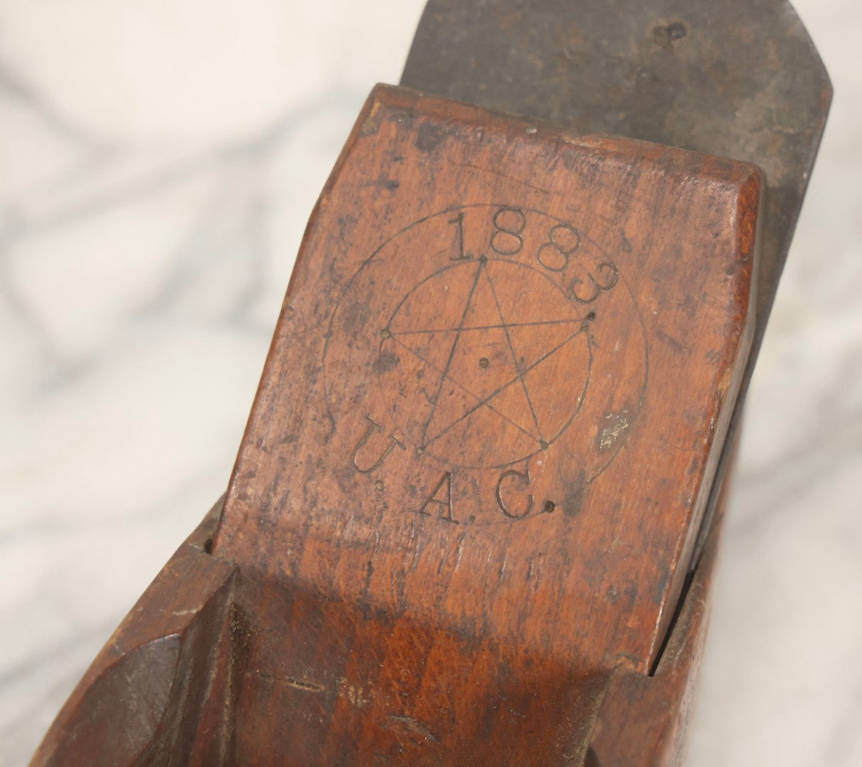 Lot 074 - Antique Handmade Coffin-Shaped Wood Plane With Engraved Pentagram Logo, Dated 1883, Marked U.A.C., Manufactured By A. Cumings, Boston, With Blade Present, 9-1/2" L
