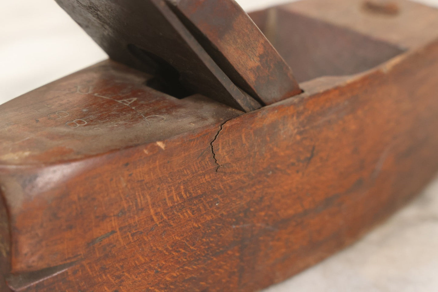 Lot 074 - Antique Handmade Coffin-Shaped Wood Plane With Engraved Pentagram Logo, Dated 1883, Marked U.A.C., Manufactured By A. Cumings, Boston, With Blade Present, 9-1/2" L
