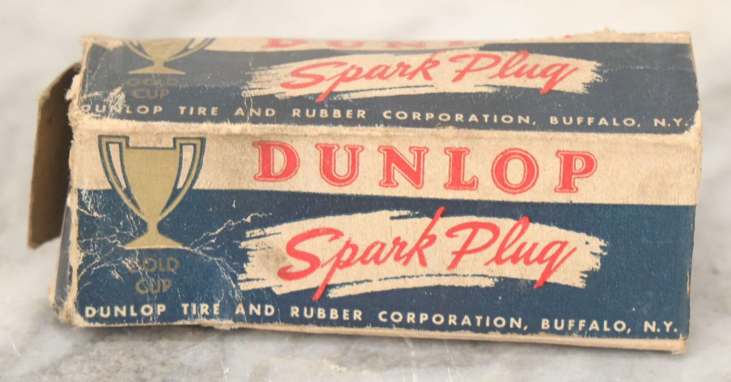 Lot 075 - Grouping Of Mixed Vintage Spark Plugs And Empty Dunlop Spark Plug Boxes Including Champion And Autolite Examples