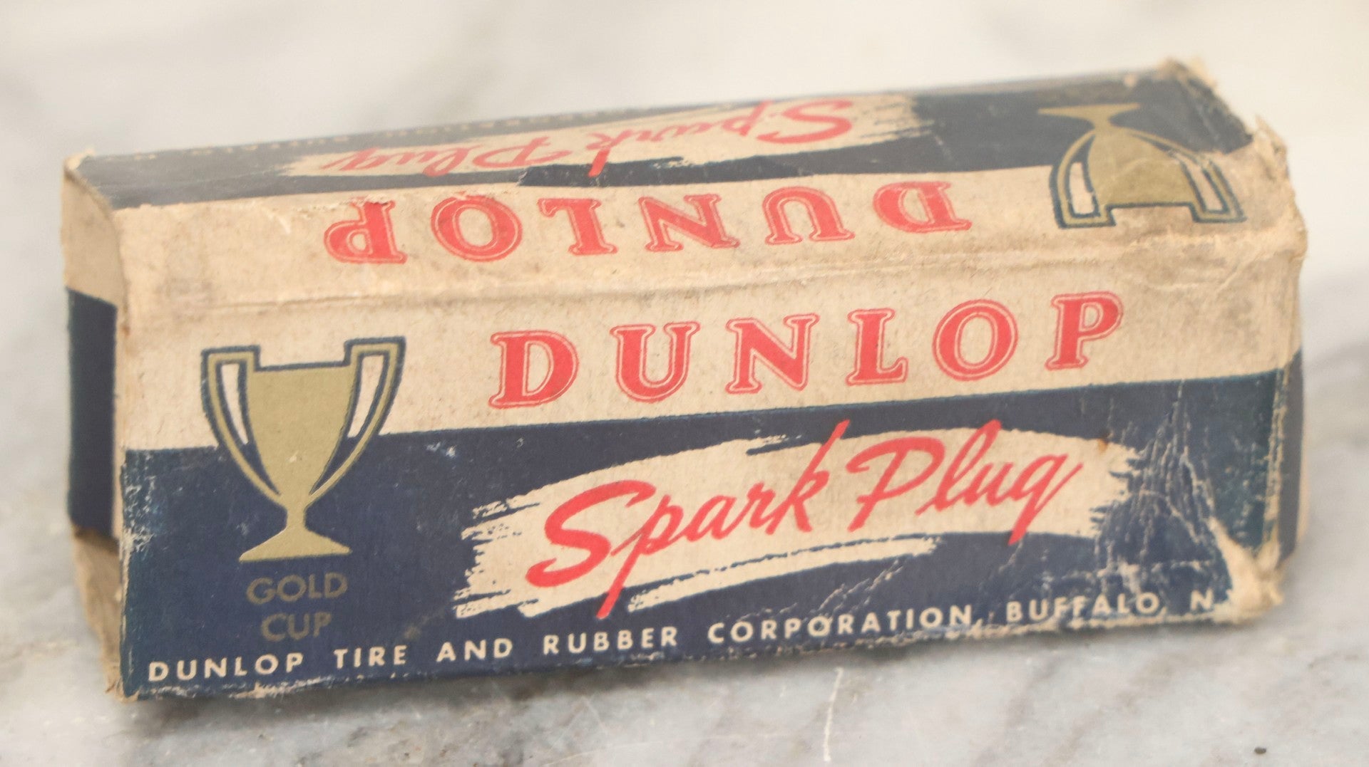 Lot 075 - Grouping Of Mixed Vintage Spark Plugs And Empty Dunlop Spark Plug Boxes Including Champion And Autolite Examples