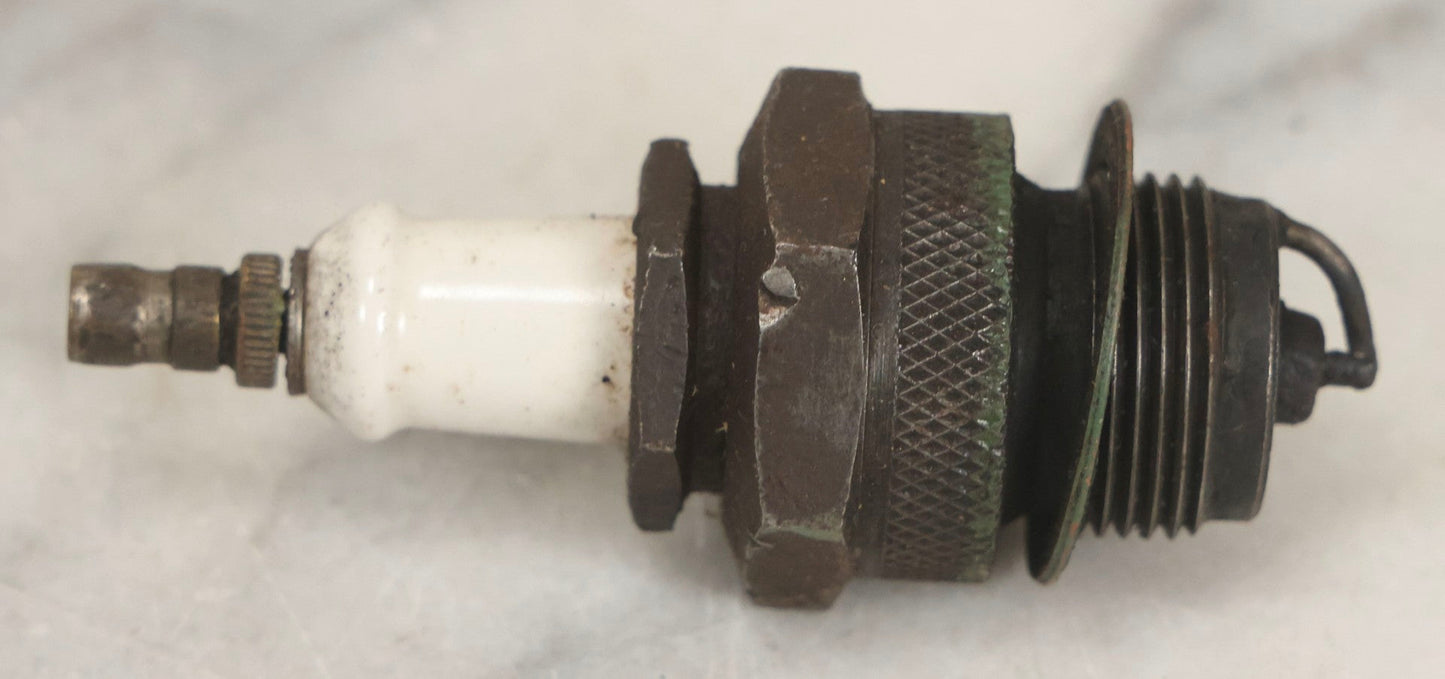 Lot 075 - Grouping Of Mixed Vintage Spark Plugs And Empty Dunlop Spark Plug Boxes Including Champion And Autolite Examples