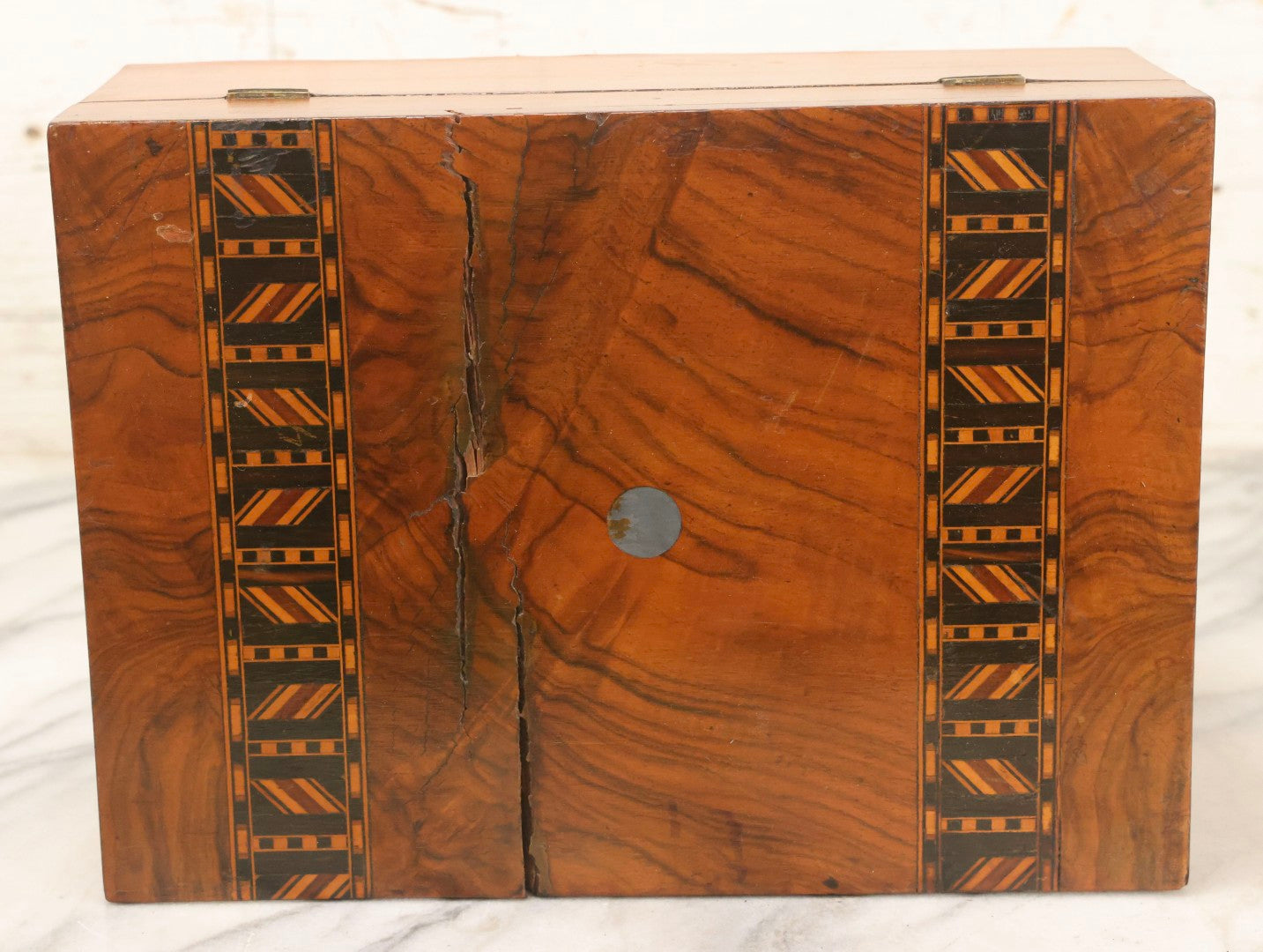 Lot 077 - Antique Burlwood Veneered Wooden Document Box With Inlaid Geometric Patterned Stripes And Center Metal Pendant