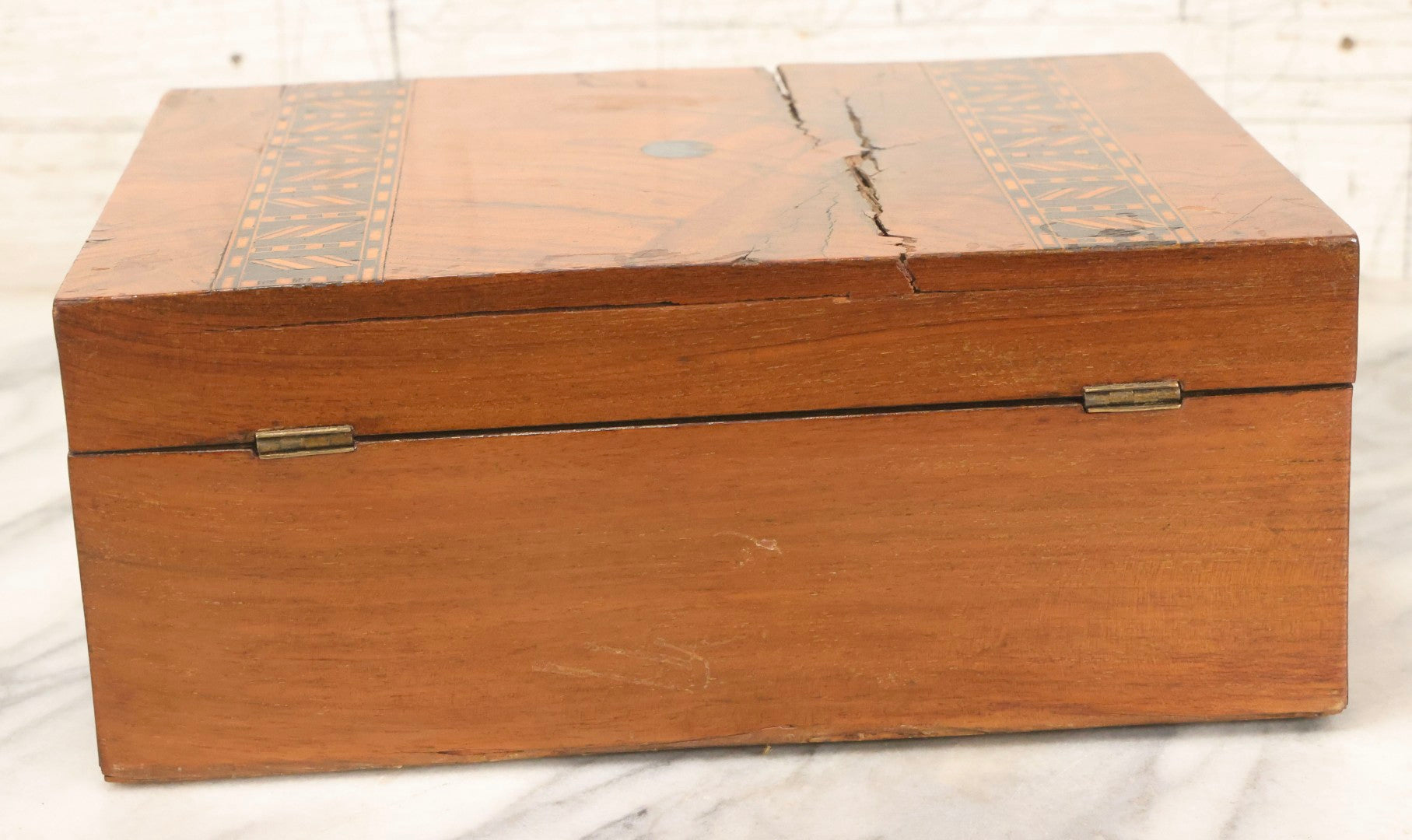 Lot 077 - Antique Burlwood Veneered Wooden Document Box With Inlaid Geometric Patterned Stripes And Center Metal Pendant