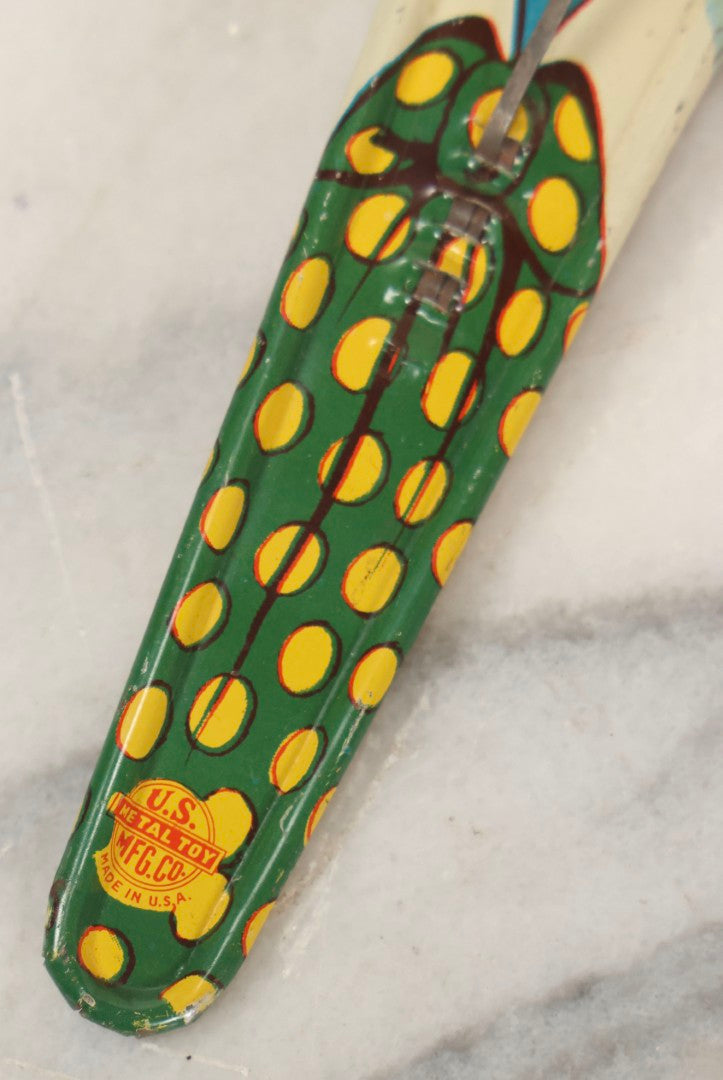 Lot 096 - Vintage Tin Lithograph Horned Clown Noise Maker With Wooden Ball Knockers, U.S. Toy Metal Mfg. Co., Made In USA.