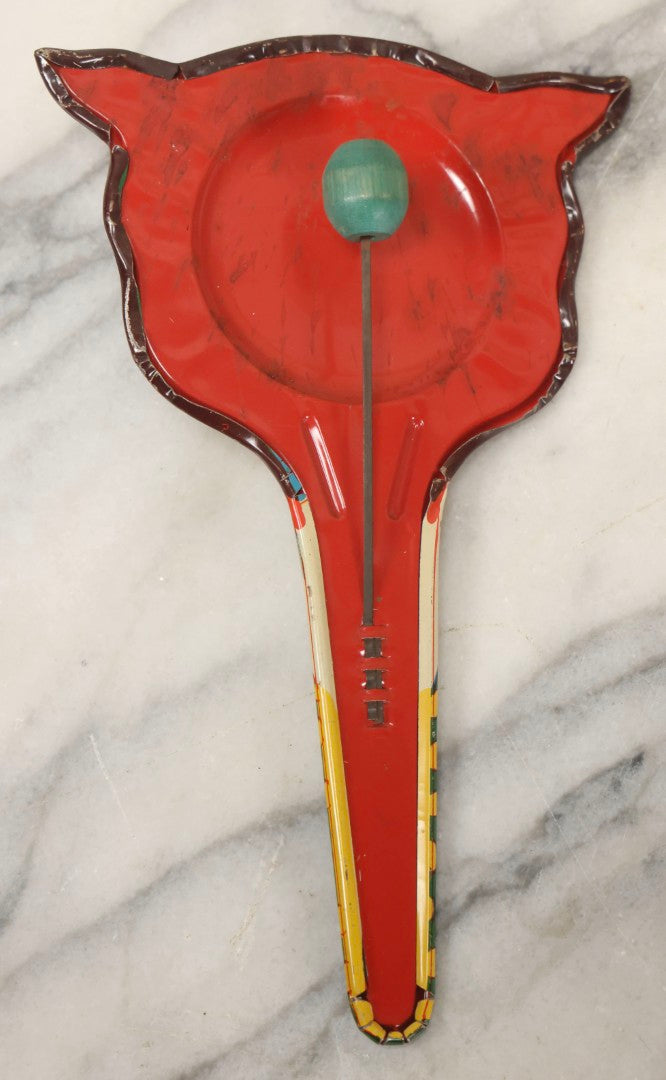 Lot 096 - Vintage Tin Lithograph Horned Clown Noise Maker With Wooden Ball Knockers, U.S. Toy Metal Mfg. Co., Made In USA.