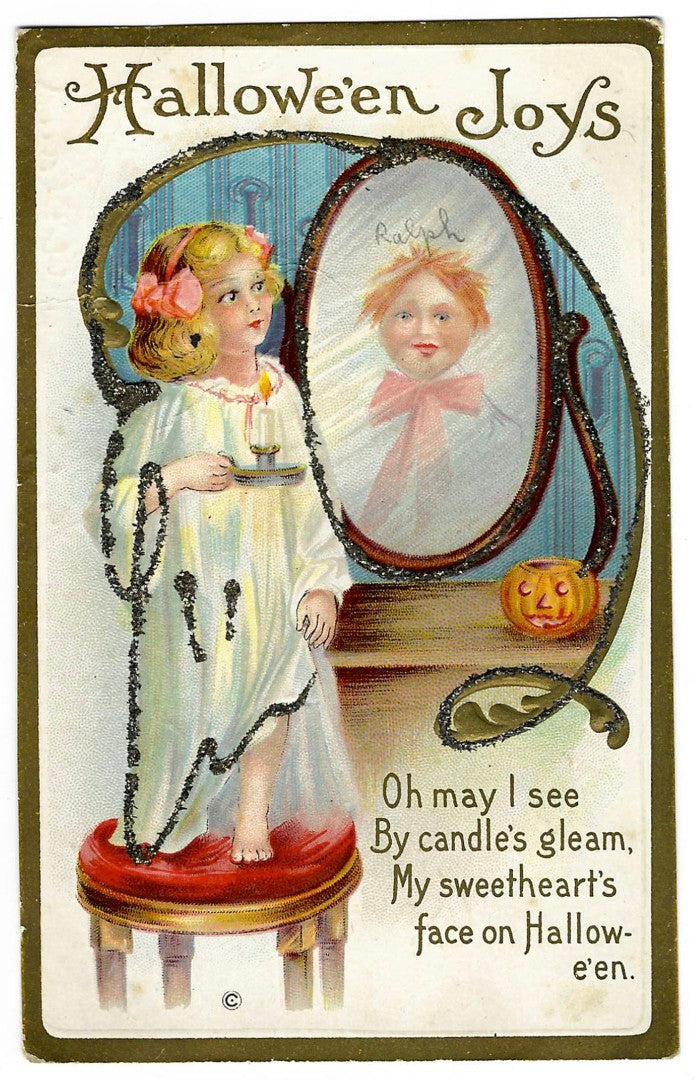 Lot 134 - Antique Embossed Glitter Hallowe'en Postcard “Hallowe'en Joys” Depicting Girl With Candle Before Mirror, “Ralph” Written In Reflection, Series 226A, Not Postmarked, Addressed To Cleveland, Ohio