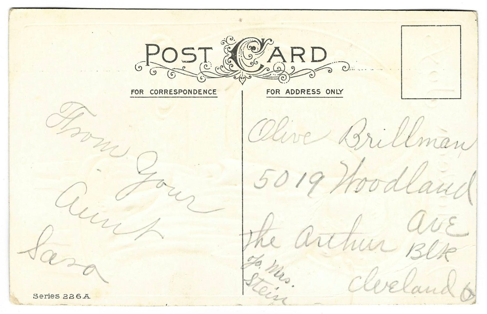 Lot 134 - Antique Embossed Glitter Hallowe'en Postcard “Hallowe'en Joys” Depicting Girl With Candle Before Mirror, “Ralph” Written In Reflection, Series 226A, Not Postmarked, Addressed To Cleveland, Ohio