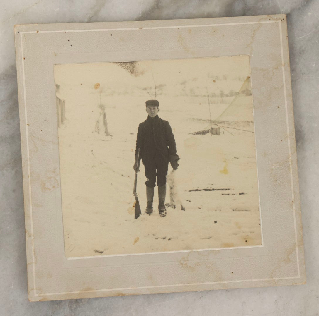 Lot 185 - Grouping Of Six Antique Hunting And Outdoor Photographs Including RPPC Of Young Man With Porcupine Kill At Campsite, Two Snapshots With Deer, Geese, And Gun, And Mounted Winter Photo Of Man With Rabbit, Hubert Soule, Fairfield, Vermont