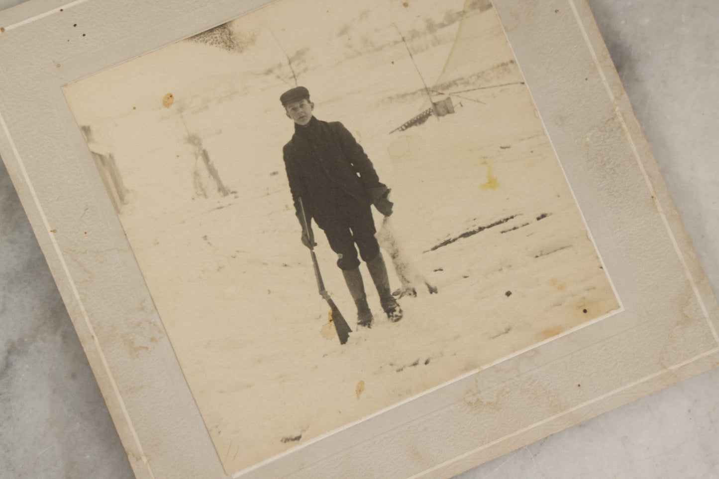 Lot 185 - Grouping Of Six Antique Hunting And Outdoor Photographs Including RPPC Of Young Man With Porcupine Kill At Campsite, Two Snapshots With Deer, Geese, And Gun, And Mounted Winter Photo Of Man With Rabbit, Hubert Soule, Fairfield, Vermont