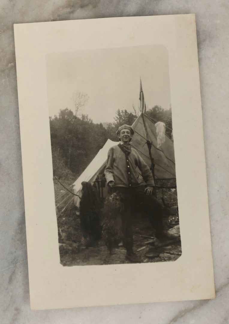 Lot 185 - Grouping Of Six Antique Hunting And Outdoor Photographs Including RPPC Of Young Man With Porcupine Kill At Campsite, Two Snapshots With Deer, Geese, And Gun, And Mounted Winter Photo Of Man With Rabbit, Hubert Soule, Fairfield, Vermont