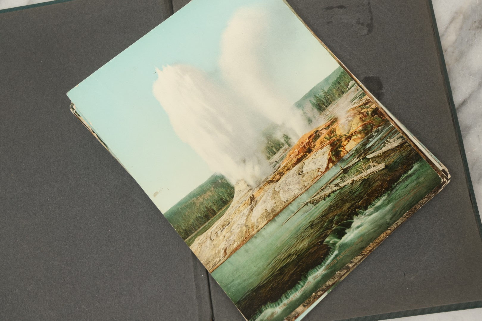 Lot 238 - Antique “Postal Cards” Scrapbook Album Containing Yellowstone Photographs, Postcards, And Ephemera Including Large-Format 1898–1902 Prints By Detroit Photographic Co., Ward's Postal Card Album, Boston, Massachusetts