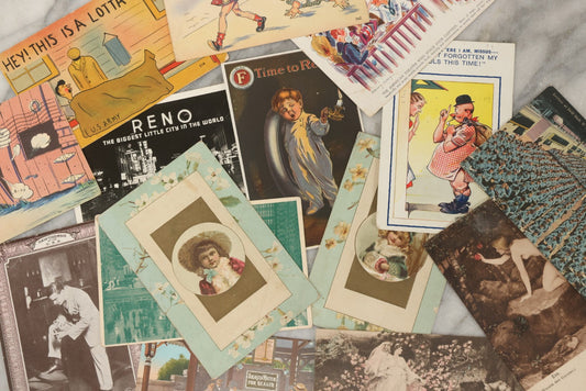 Lot 243 - Grouping Of 15 Antique And Vintage Postcards Including Fisk Tires And Shasta Water Advertising, Douglas Fairbanks Movie Promotion, Early Reno Undivided Back, Mythological Subjects, And Wwii Comic Cards