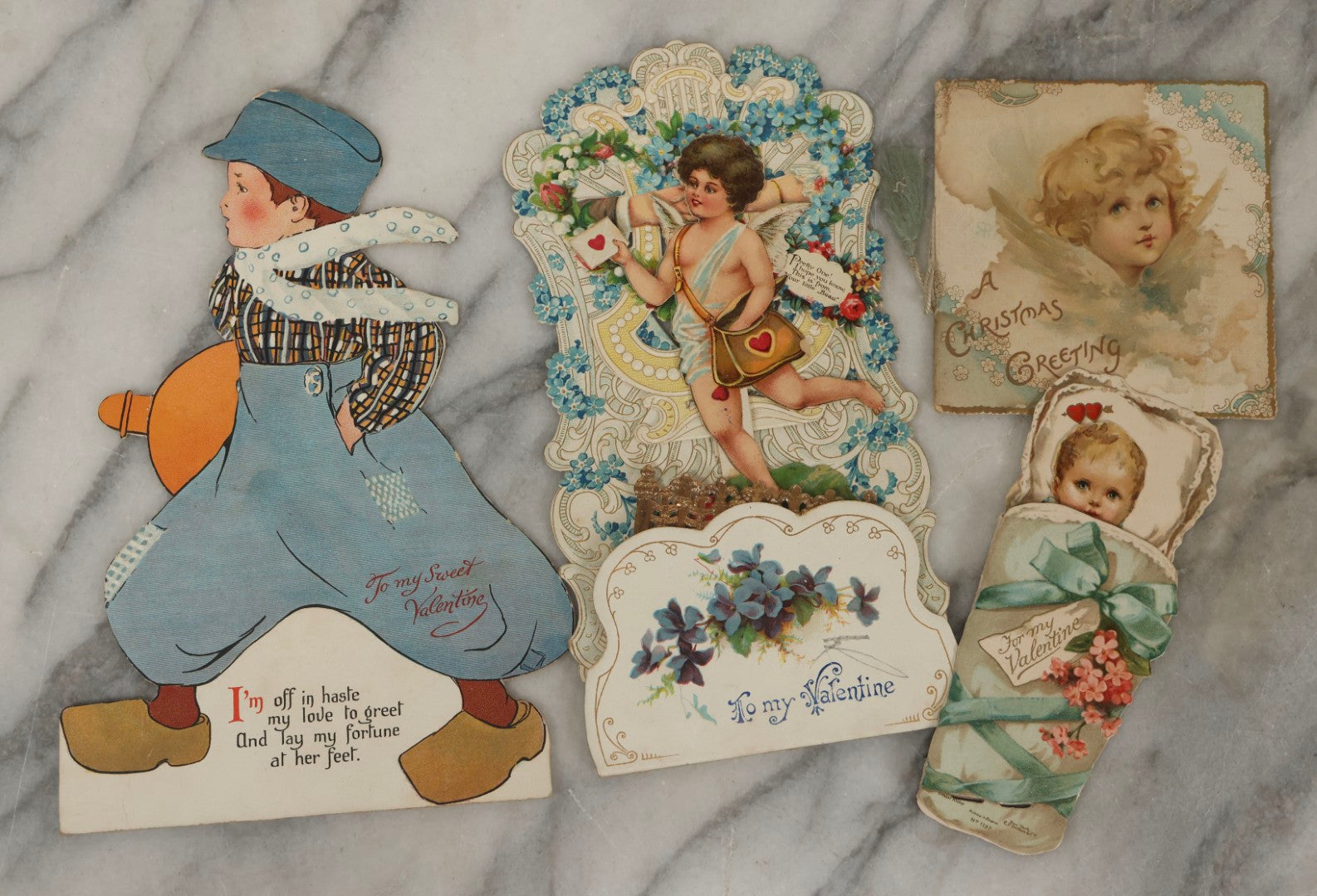 Lot 250 - Grouping Of Four Antique Valentine And Christmas Cards Including Mechanical And Booklet Formats, Ernest Nister And Castell Brothers Ltd., London And New York