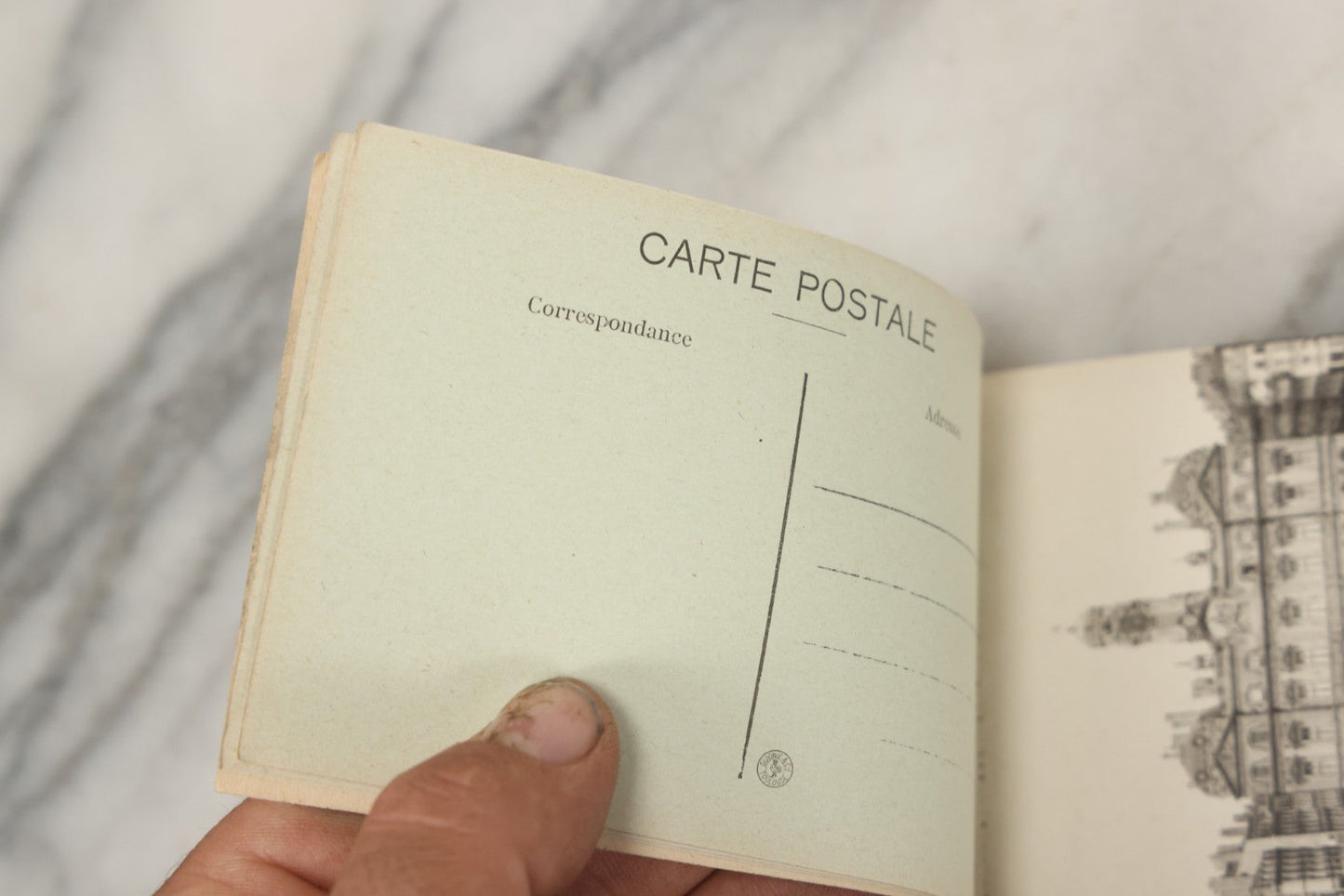 Lot 252 - Antique Souvenir Postcard Album “Album-Souvenir” With Embossed Gilt Cover Nude Woman On Globe, Containing Twenty Perforated Postcards Of Lyon, France