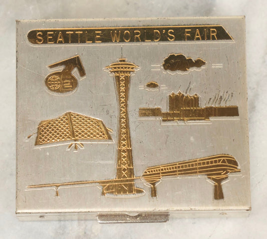 Lot 265 - Vintage Seattle World's Fair Chrome Compact With Mirror And Powder Pad Featuring Brass Landmarks Including Space Needle