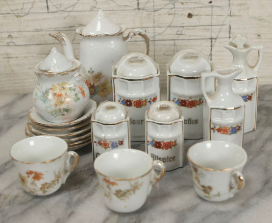 Lot 269 - Grouping Of Vintage And Antique Porcelain Miniatures Including German Spice Set Marked Germany With Coffee, Oil, Cinnamon, Flour, Vinegar, And Allspice Vessels, And Miniature Tea Set With Teapot, Cups, And Plates