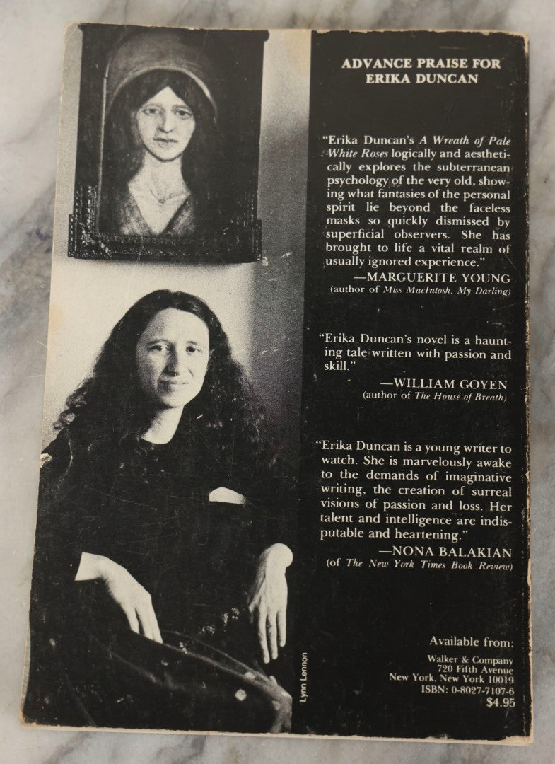 Lot 280 - "A Wreath Of Pale White Roses" Vintage Inscribed Paperback Novel By Erika Duncan, Published By Magic Circle Press, Weston, Ct, 1977, With Author's Signed Gift Inscription And Accompanying Postcard Invitation To Joint Book Release With Anaïs Nin