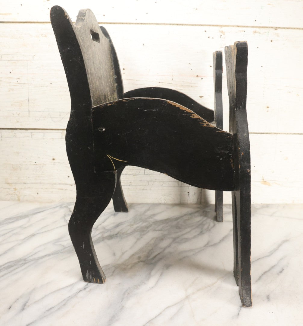 Lot 001 - Vintage Folk Art Wooden Black Cat Child's Seat With Red Bow Ties And Domed Eyes, Hand Painted With Sponge Painted Texture Finish, Circa 1930s