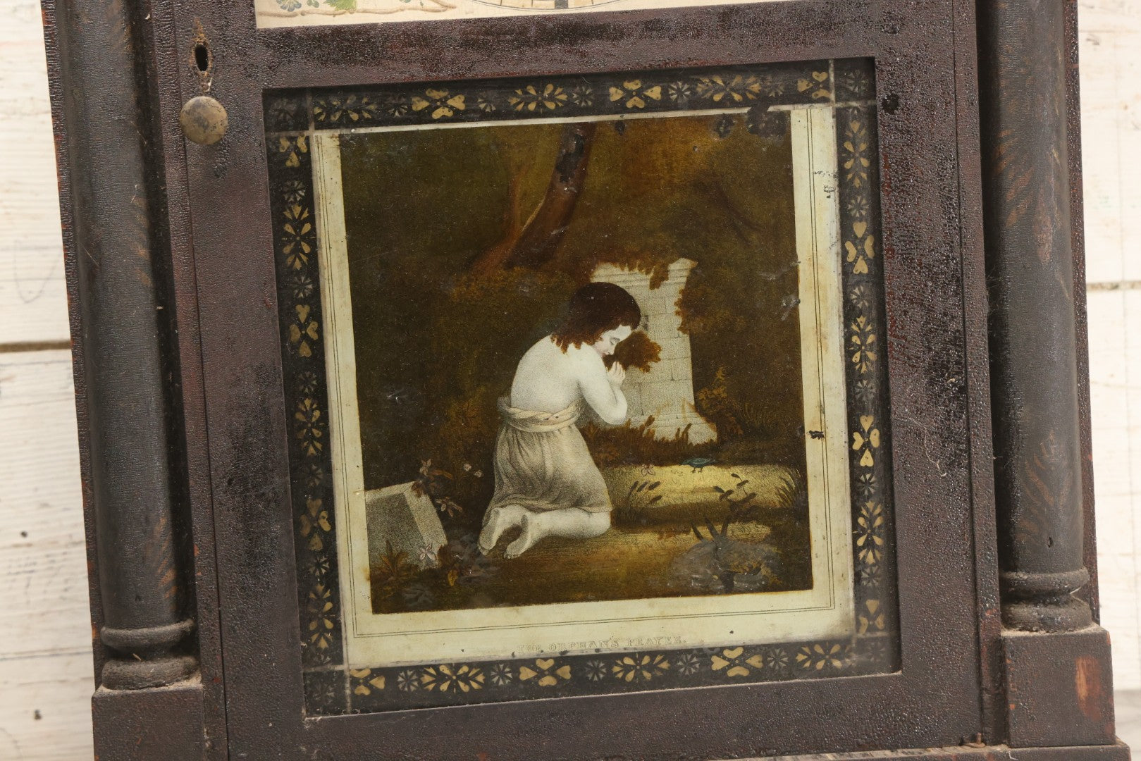 Lot 004 - Antique Column And Splat Shelf Clock By Riley Whiting, Winchester, Connecticut, With 30-Hour Wooden Works And Reverse Painted Door With “The Orphan's Prayer” Scene, Child Praying At Monument, Includes Weights, Pendulum, And Key