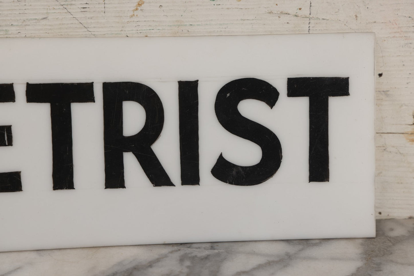 Lot 011 - Vintage Hand-Painted "Optometrist" Trade Sign On White Plexiglass, 23-1/2" x 6"