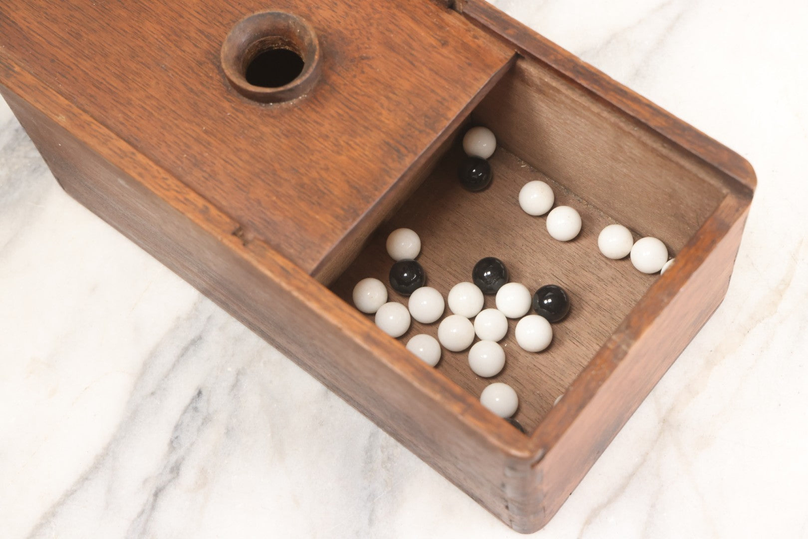 Lot 019 - Antique Hand Made Folk Art Wooden Ballot Box With Sliding Top And Fourteen-Sided Pull Knob, Includes Vintage Black And White Voting Marbles, Circa 1900