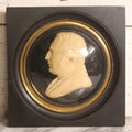 Lot 022 - Antique Wax Portrait Relief Of Gentleman Signed G. Grütter, Mounted On Reverse-Painted Glass Under Convex Dome, Continental, Circa 1830–1845, 10-3/8" x 10-1/2"