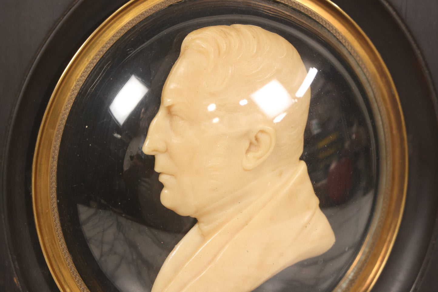 Lot 022 - Antique Wax Portrait Relief Of Gentleman Signed G. Grütter, Mounted On Reverse-Painted Glass Under Convex Dome, Continental, Circa 1830–1845, 10-3/8" x 10-1/2"