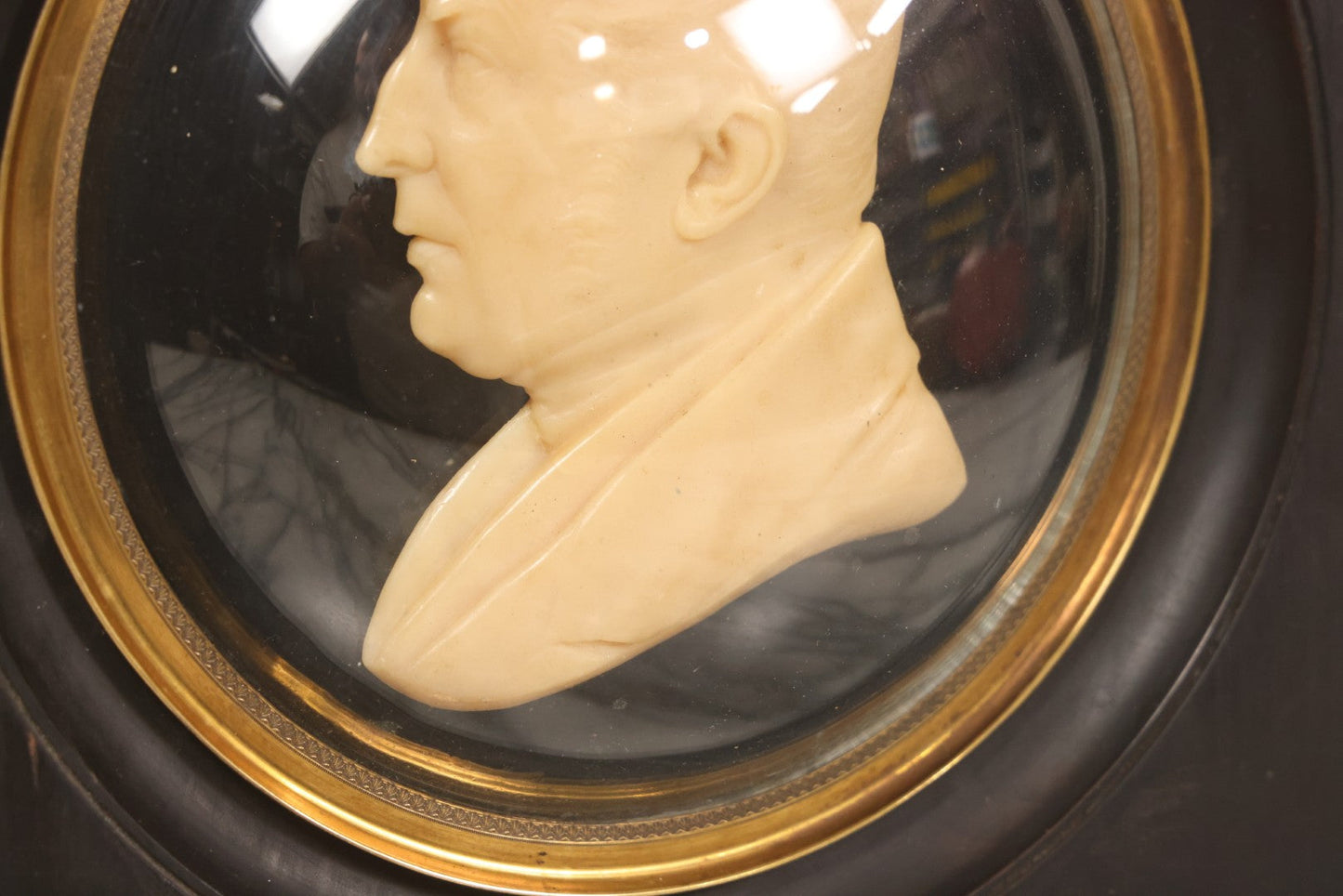 Lot 022 - Antique Wax Portrait Relief Of Gentleman Signed G. Grütter, Mounted On Reverse-Painted Glass Under Convex Dome, Continental, Circa 1830–1845, 10-3/8" x 10-1/2"