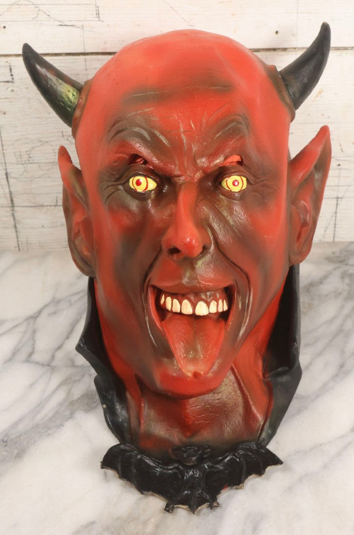 Lot 023 - Vintage Rubber Grinning Devil Halloween Mask With Yellow Eyes, Tongue Out, And Bat Bow Tie, Illusive Concepts, 1996, Distributed By The Paper Magic Group, Scranton, Pennsylvania