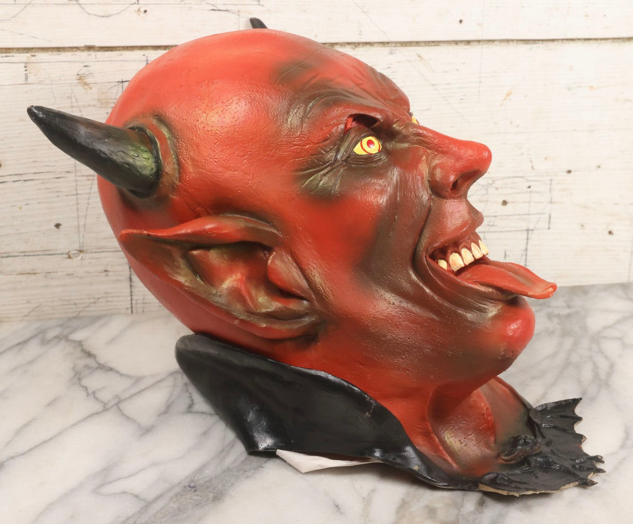 Lot 023 - Vintage Rubber Grinning Devil Halloween Mask With Yellow Eyes, Tongue Out, And Bat Bow Tie, Illusive Concepts, 1996, Distributed By The Paper Magic Group, Scranton, Pennsylvania
