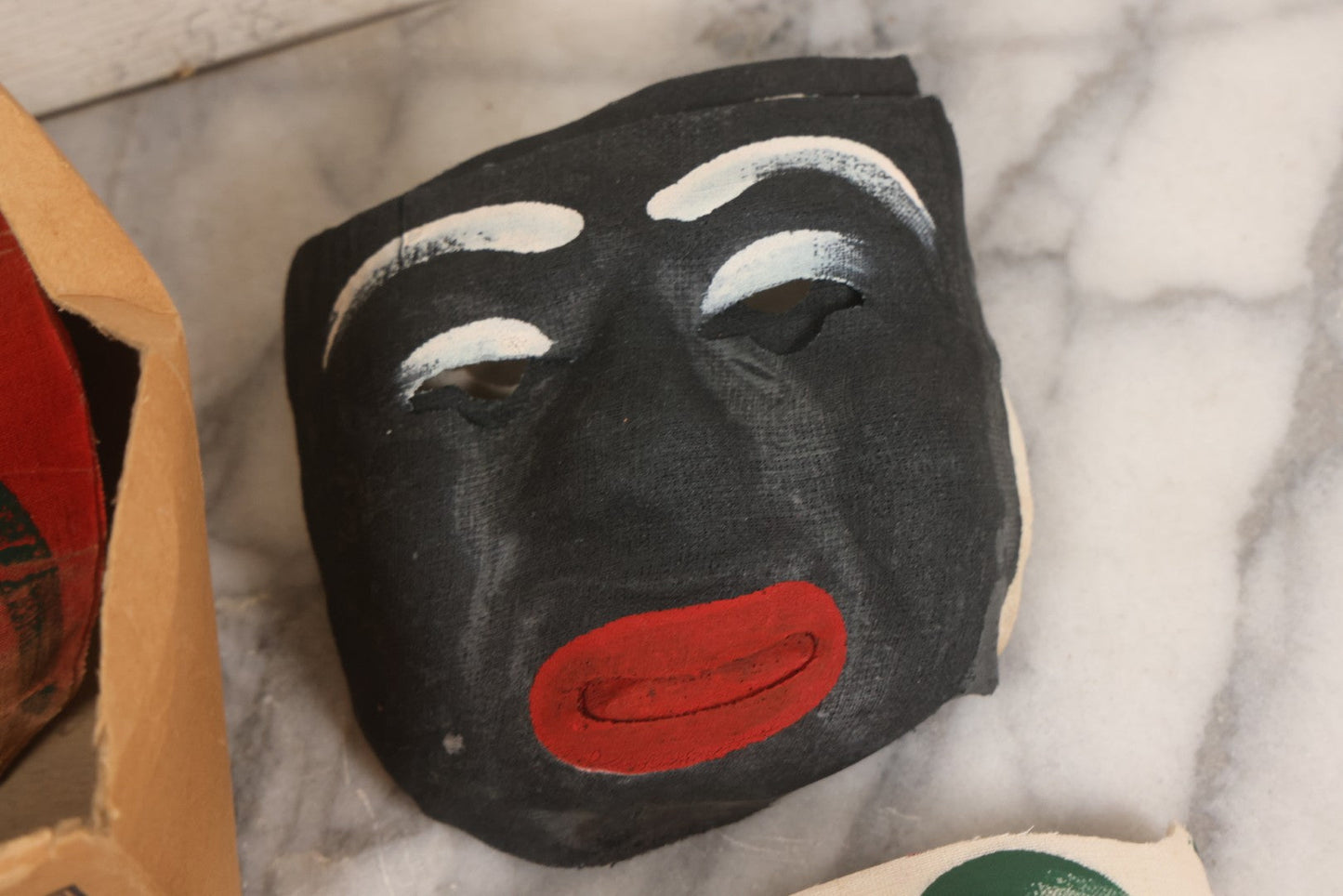 Lot 024 - Grouping Of 50 Vintage New Old Stock N.O.S. Gauze Clown Halloween Masks In Original Des Arts Products Box, No. 764, "Masks, The Universal Toy"