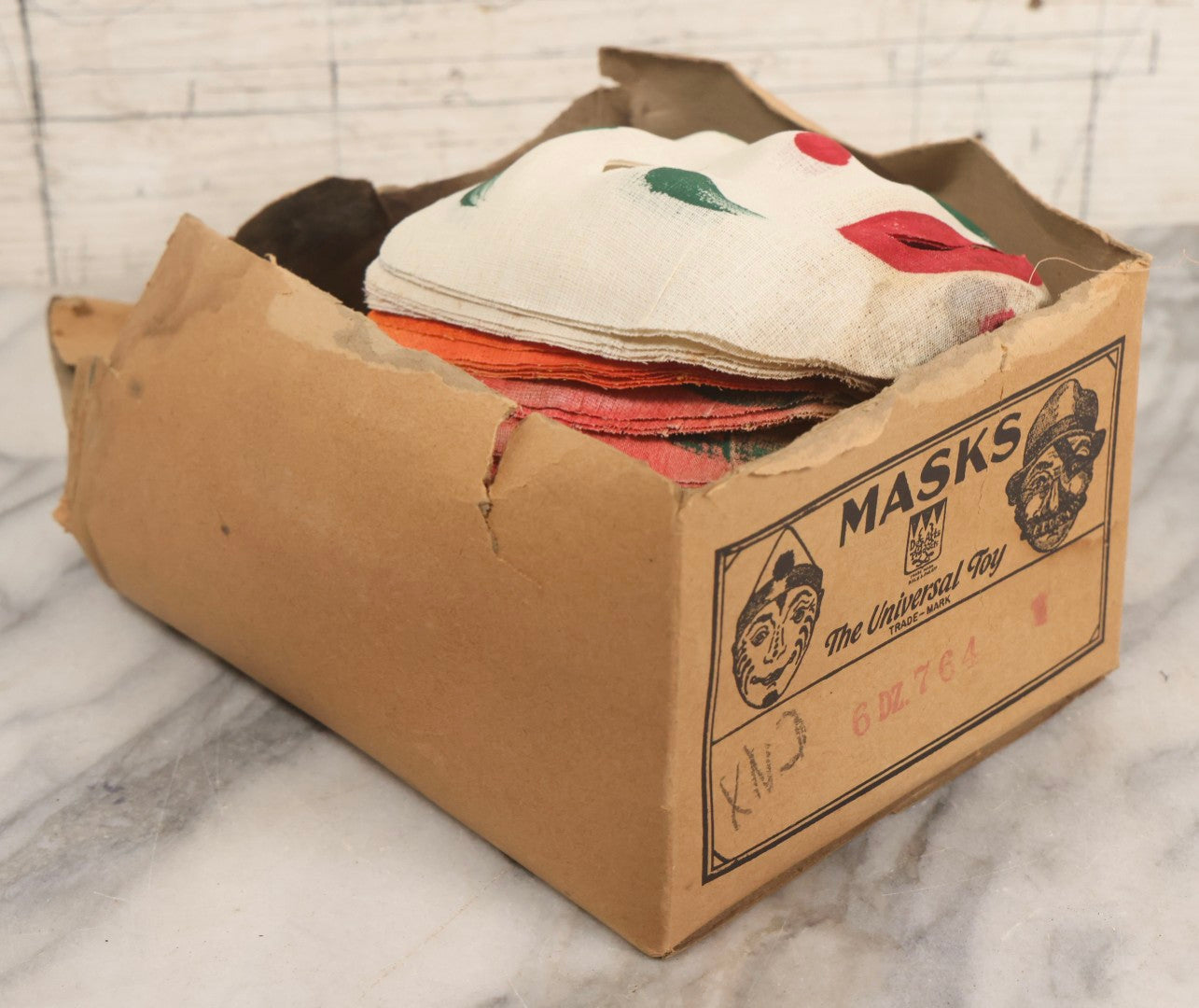 Lot 024 - Grouping Of 50 Vintage New Old Stock N.O.S. Gauze Clown Halloween Masks In Original Des Arts Products Box, No. 764, "Masks, The Universal Toy"