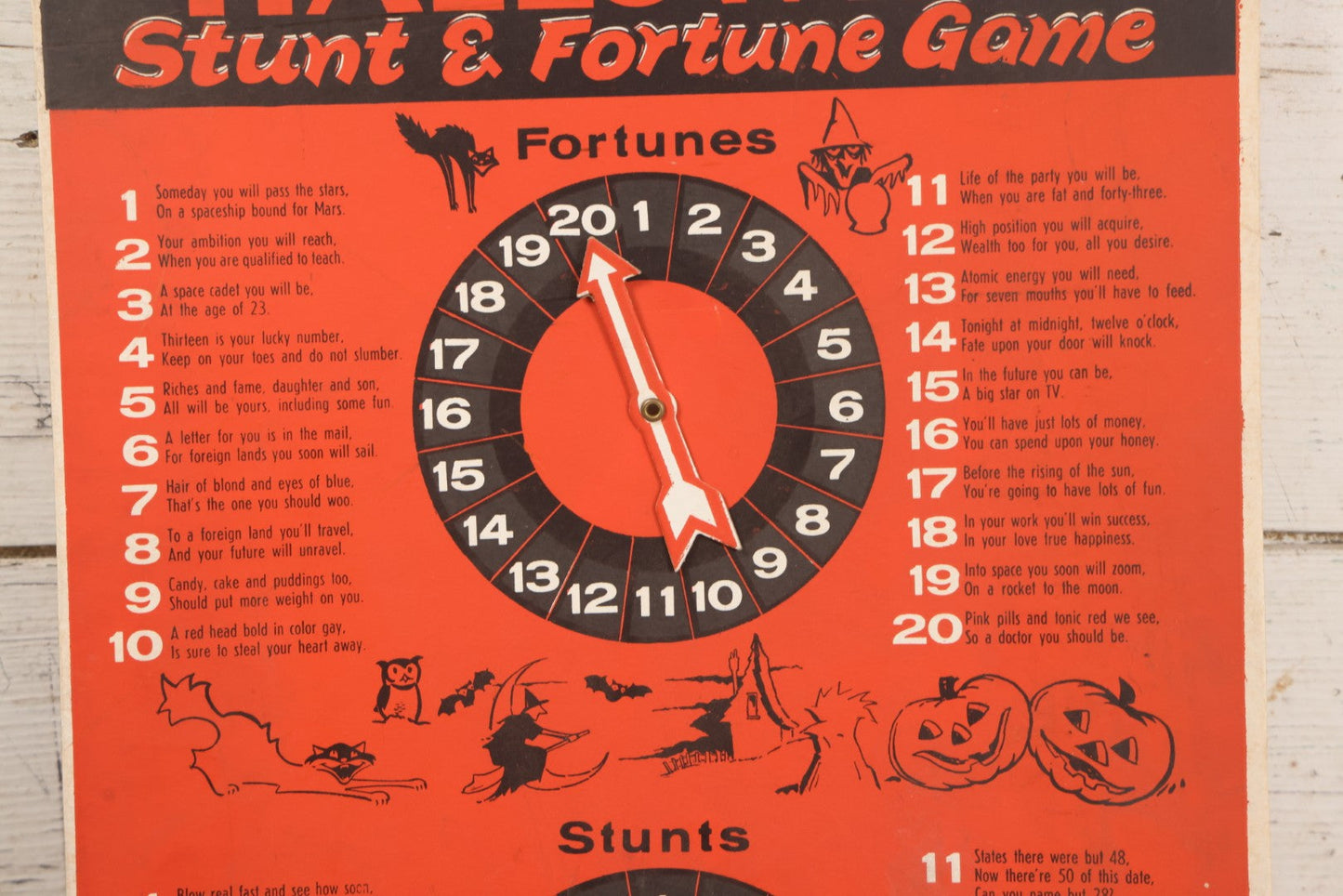 Lot 025 - Vintage Spin-O-Rama Halloween Stunt And Fortune Game By Beistle With Witch, Black Cat, And Jack-O-Lantern J.O.L. Graphics, Made In U.S.A.., 12-3/8" x 18-3/8"