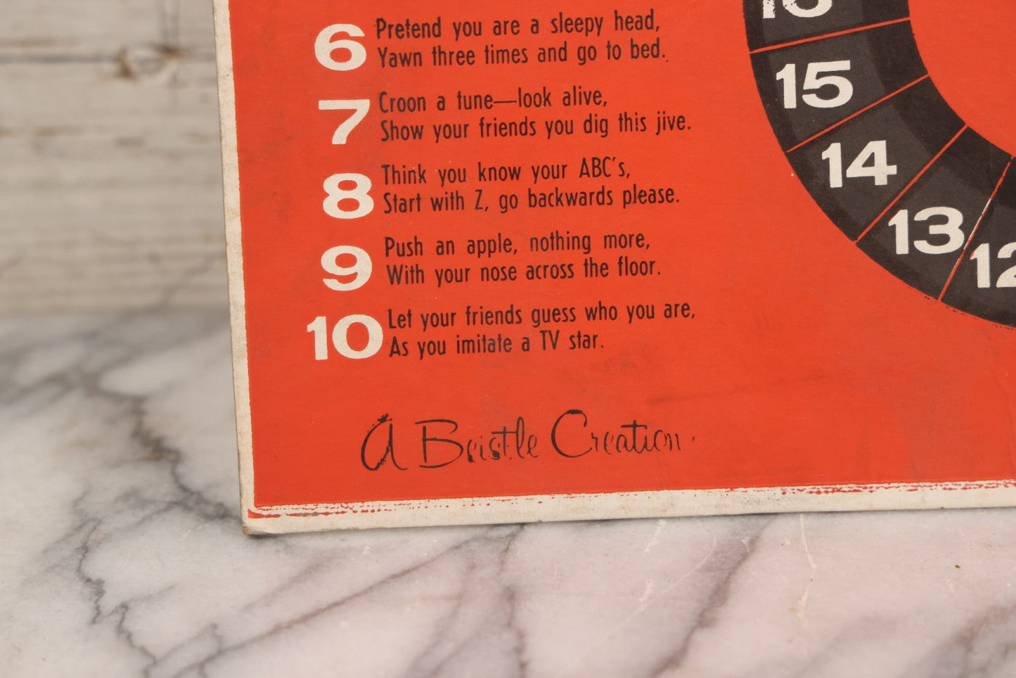 Lot 025 - Vintage Spin-O-Rama Halloween Stunt And Fortune Game By Beistle With Witch, Black Cat, And Jack-O-Lantern J.O.L. Graphics, Made In U.S.A.., 12-3/8" x 18-3/8"