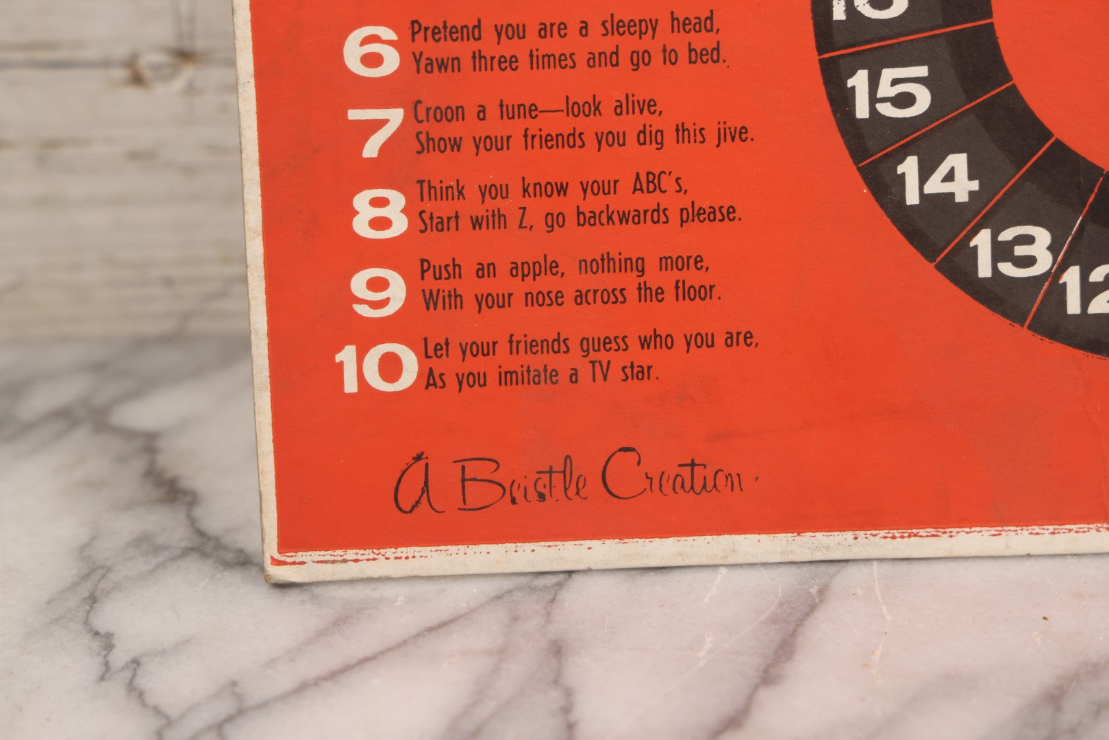 Lot 025 - Vintage Spin-O-Rama Halloween Stunt And Fortune Game By Beistle With Witch, Black Cat, And Jack-O-Lantern J.O.L. Graphics, Made In U.S.A.., 12-3/8" x 18-3/8"