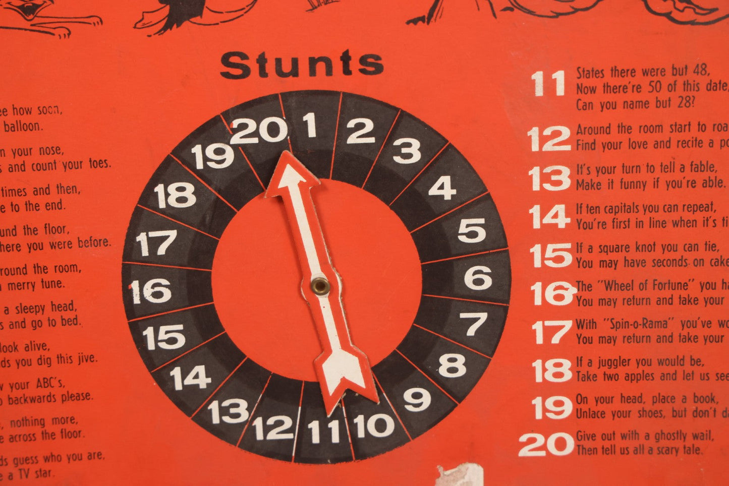 Lot 025 - Vintage Spin-O-Rama Halloween Stunt And Fortune Game By Beistle With Witch, Black Cat, And Jack-O-Lantern J.O.L. Graphics, Made In U.S.A.., 12-3/8" x 18-3/8"