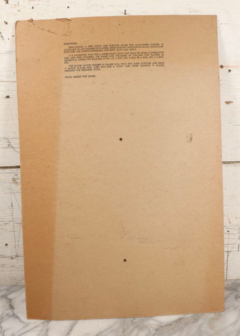 Lot 025 - Vintage Spin-O-Rama Halloween Stunt And Fortune Game By Beistle With Witch, Black Cat, And Jack-O-Lantern J.O.L. Graphics, Made In U.S.A.., 12-3/8" x 18-3/8"