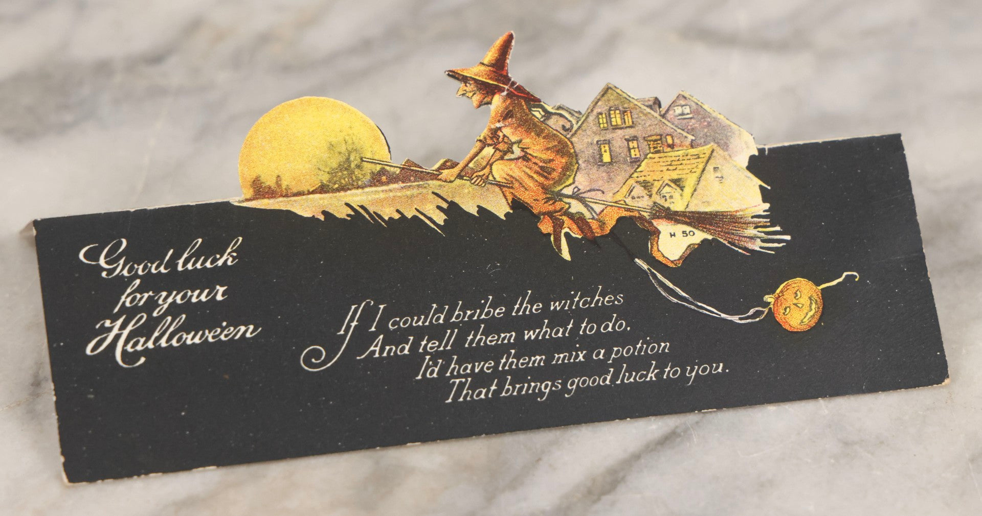 Lot 030 - Antique Die-Cut Stand-Up Halloween Card “Good Luck For Your Halloween” Flying Witch With Jack-O'-Lantern, Series H 50, Fold-Out Easel Card, Written On Verso