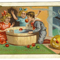 Lot 031 - Antique Illustrated Halloween Postcard “A Happy Halloween To All” Depicting Children Bobbing For Apples Beside Jack-O-Lantern, Design Copyright 1909 By M.W. Taggart, Series 804, Postmarked Elmira, New York, Written On Verso