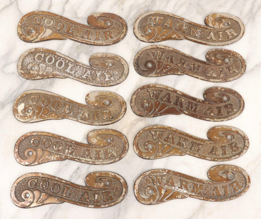 Lot 045 - Grouping Of Ten Vintage Cast Metal Air Register Badges With Scroll Design — Five “Cool Air” And Five “Warm Air”